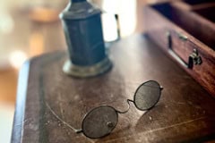 The Gregory House spectacles on table.