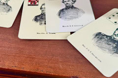 The Gregory House playing cards on table.