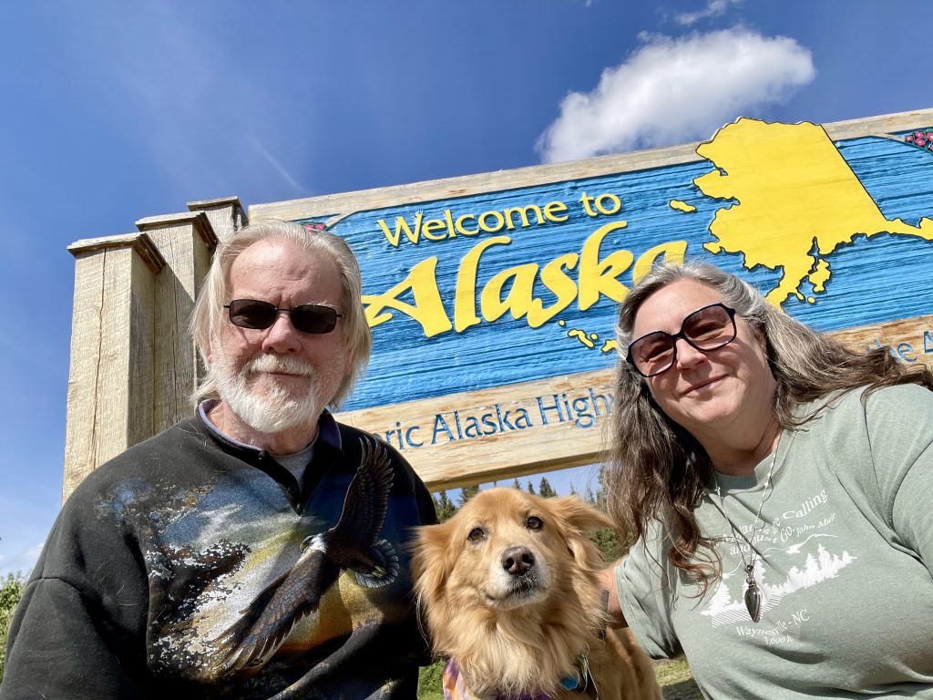 Jeff, Bella, and Cindy at the Canadian Border to Alaska.